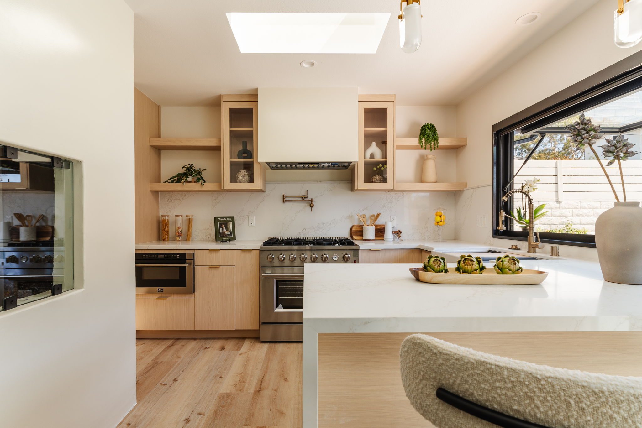 Entertainment kitchen with quartz waterfall island (1)